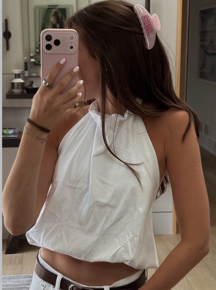 pink initial clip in loose waves