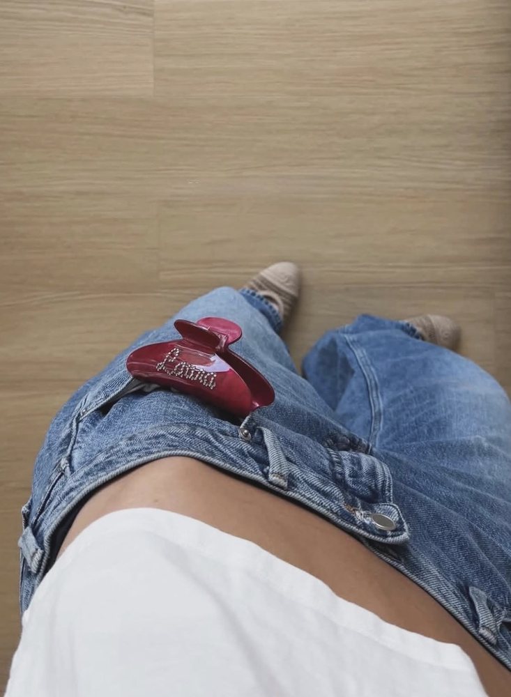 red name clip on denim