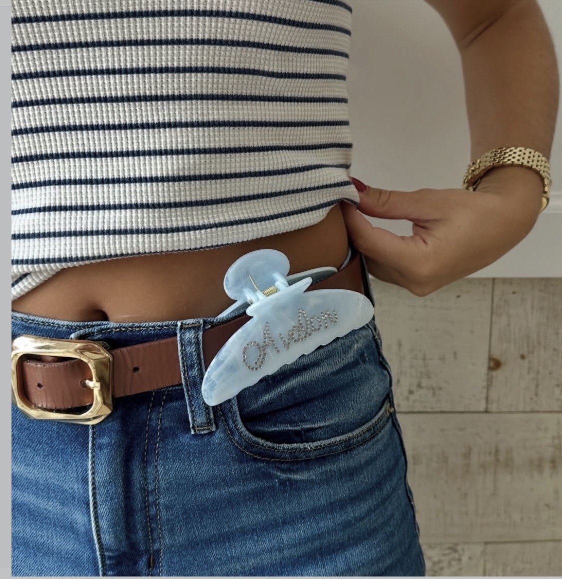 Blue flower clip on denim