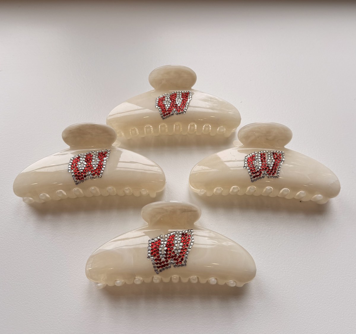 Cream clips with red rhinestone initials
