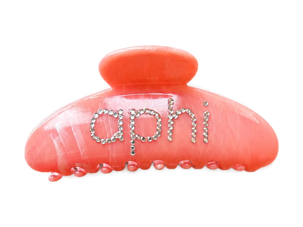 Poppins lettering on a claw clip