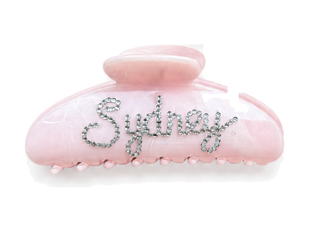 Script lettering on a claw clip